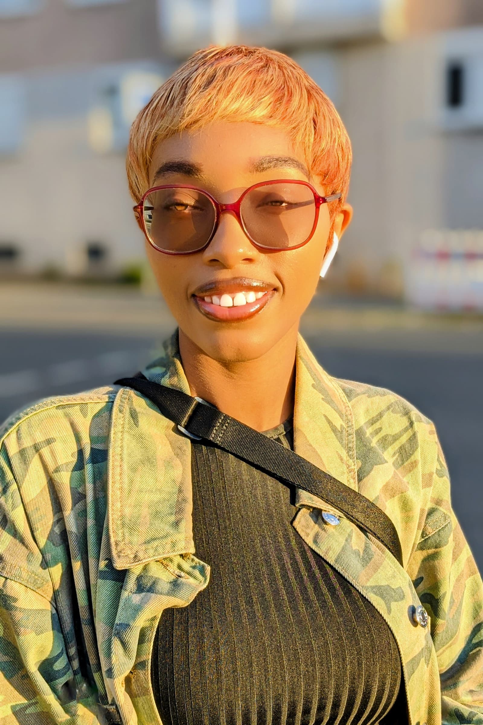 Pixie cut and camo, sunset light close-up