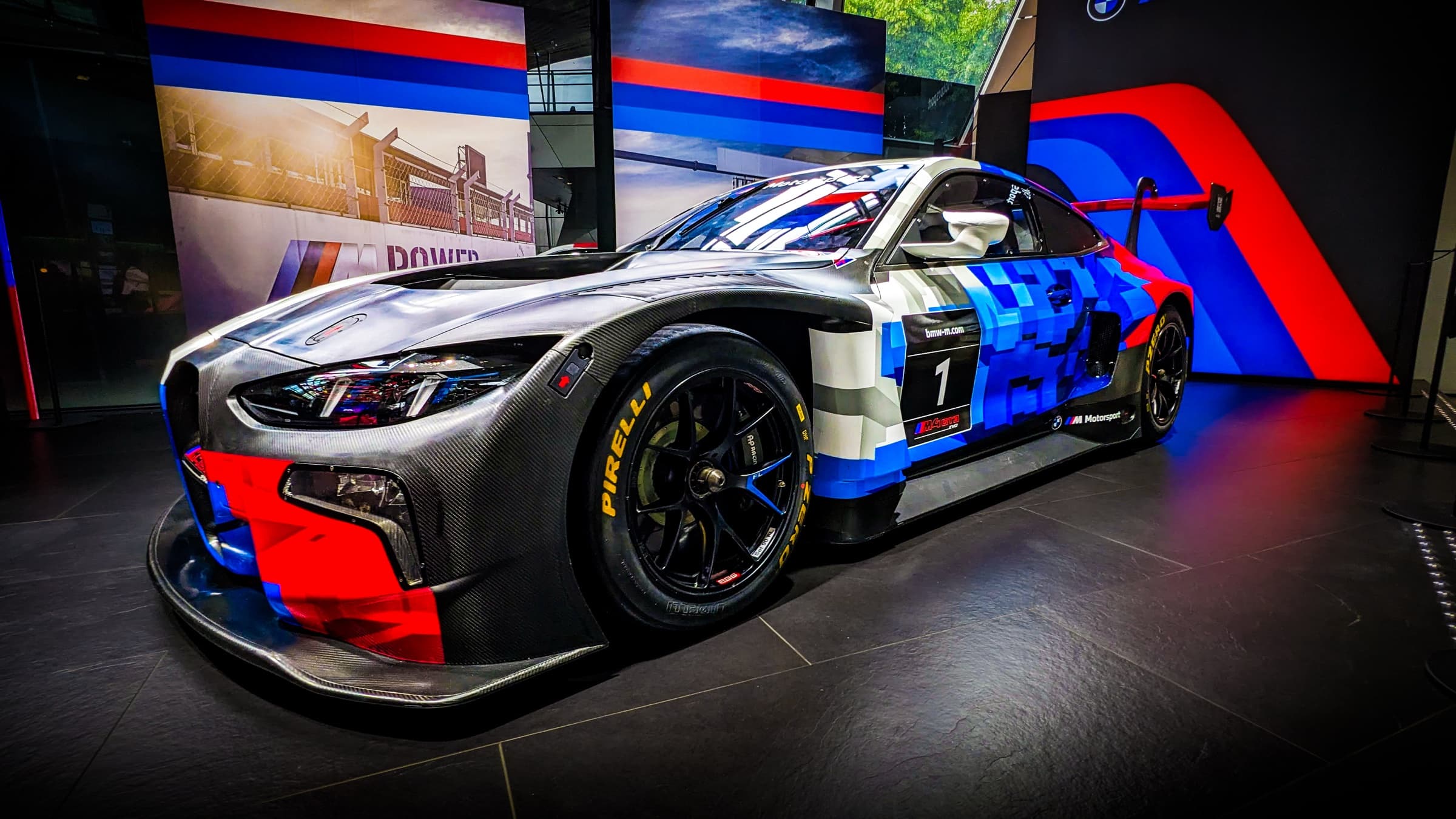 BMW M4 GT3, full broadside in showroom