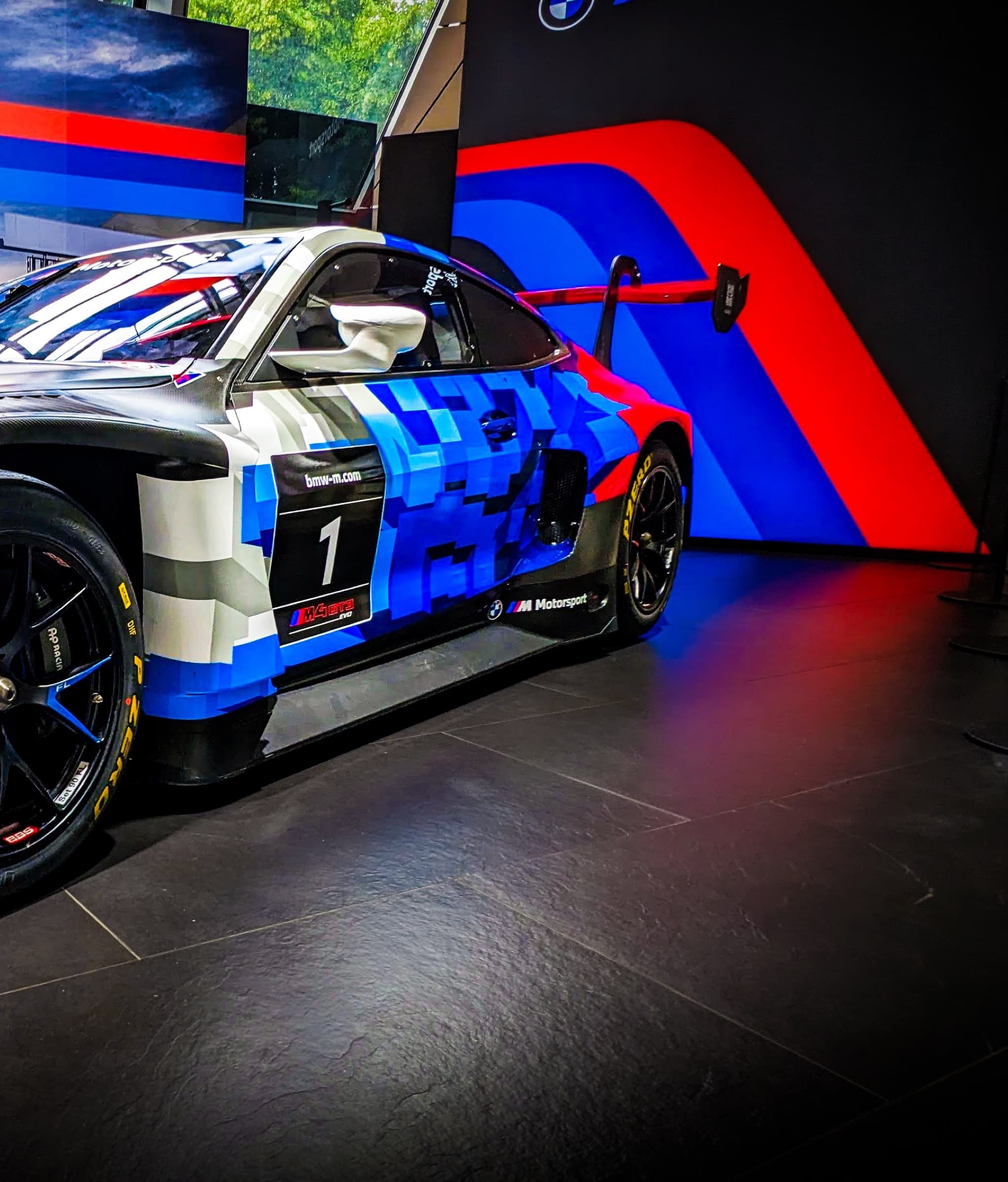 BMW M4 GT3 — rear-half close, livery and motorsport stripe