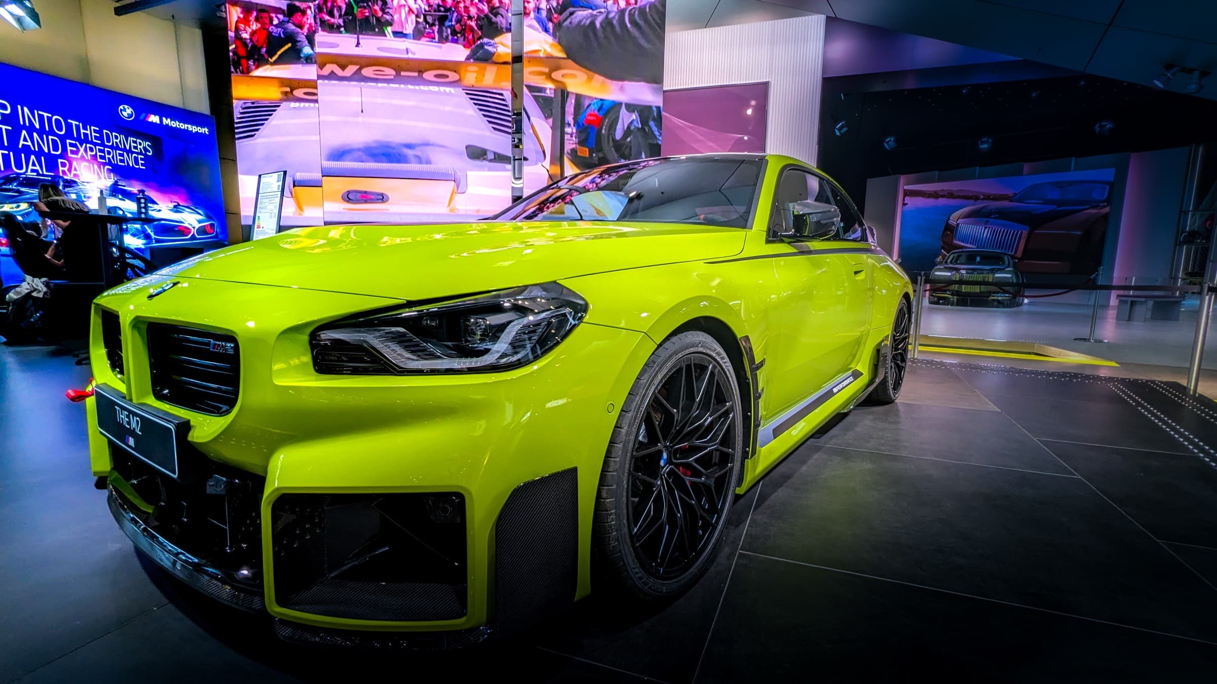 BMW M2 in vivid acid yellow, full broadside